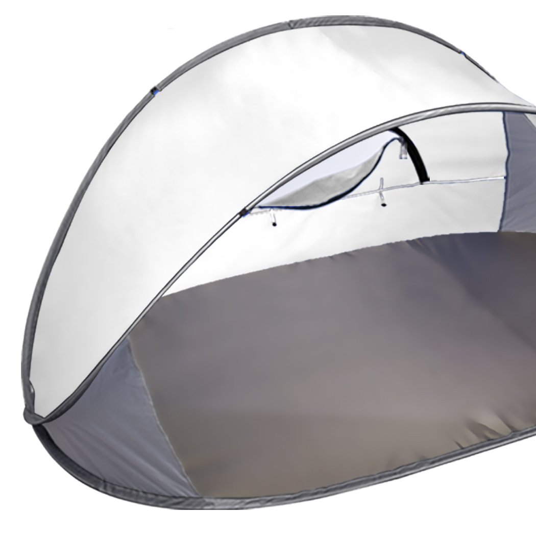 Mountvie Pop Up Tent set up at the beach, spacious enough for four people, featuring a grey color and interwoven mesh for ventilation.